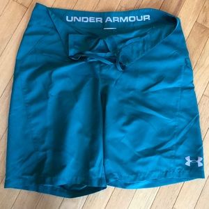 Men’s Under Armour board shorts.